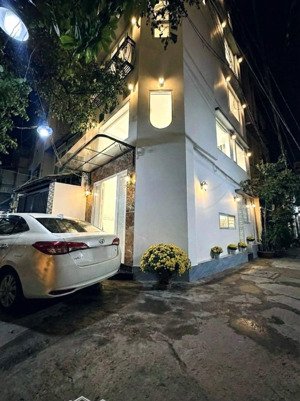 căn góc 2 mặt tiền hẻm xe hơi huỳnh văn bánh phú nhuận ~120m dtsd 5 tầng + sân thượng 3pn 4wc