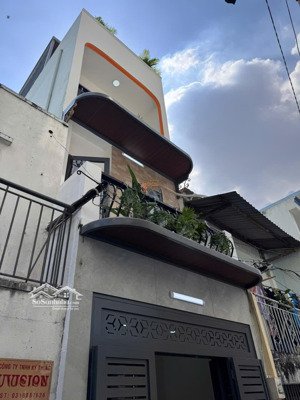 nhà mới hương lộ 2 1 trệt 2 lầu sân thượng 4pn sát ngã tư bốn xã 4 tỷ 750 tl. lh 