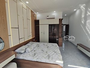nhà 2 mặt tiền 60m2 ngay ngã tư miếu ông cù thuận an