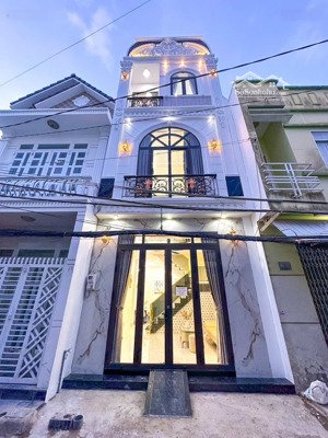 nhà 1 trệt 2 lầu mới hoàn thiện-lộ oto sổ hồng hoàn công , cách bệnh viện trung ương 150m