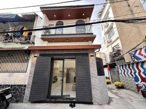 nhà hxh phan văn trị p11 quận bình thạnh dt 5m dài 6m, nở hậu, cn 27,6m2 trệt + lững + lầu