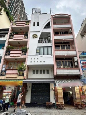 giảm 3 tỷ, mặt tiền huỳnh văn bánh 6 tầng, 180m2, ko lộ giới, nhà mới dòng tiền cao, chốt 9,4 tỷ