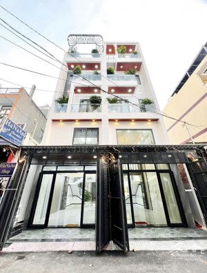 nhà phố 4m x 18m 4.5 tầng mặt tiền đường trung mỹ tây 13a - tô ký ngay phần mềm quang trung