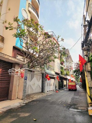 cần bán nhà quận 3 đường lê văn sỹ,dt 4x15 kết cấu 4 tầng