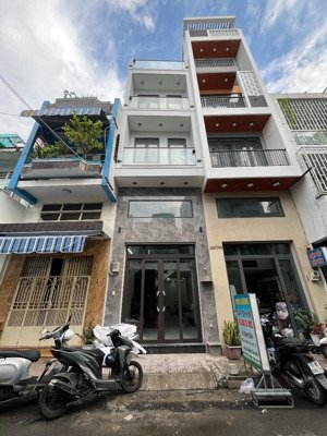 bán nhà mặt tiền kinh doanh xây mới kiên cố