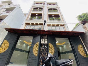 lên sóng cặp nhà phố xây mới - thang máy - giá cực yêu thương tại quang trung