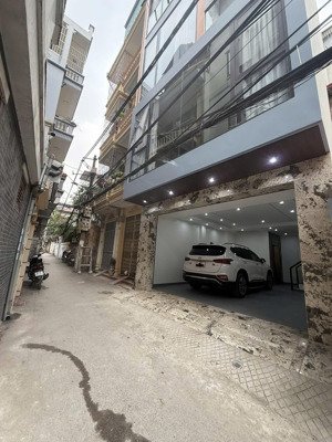 nhà đội cấn ô tô vào nhà 7tầng thang máy tặng nội thất 55m2 24,7 tỷ