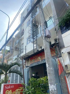 chdv mặt tiền dương khuê tân phú 9 phòng + 1 mặt bằng dòng tiền 40 triệu/tháng giá 12.2 tỷ