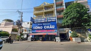 bán nhà mặt tiền 26-28 nguyễn cửu vân, dt: 10x20m, hđ thuê 130 triệu/tháng, giá 59 tỷ tl