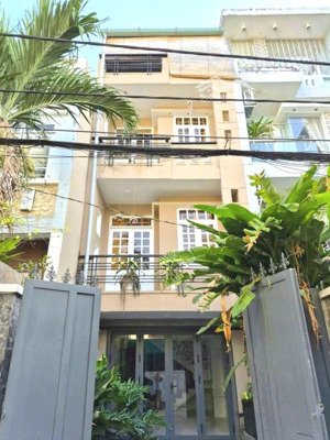 nhà 2 lầu + sân thượng 68.1m2 hẻm xe hơi thông đường số 51, gần bờ kênh