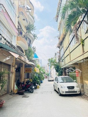 nhà gần 100m2 ngang 5m nở hậu 8m xe hơi ngủ trong nhà âu dương lân