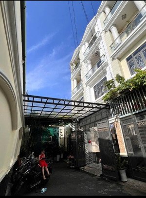 quận tân bình bán nhà 4x15m+4 tầng-hxh 1 trục ,nội thất cao cấp,dân trí cao,đường nguyễn sỹ sách.