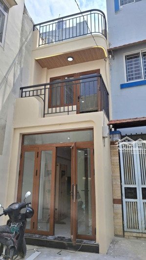 hẻm xe hơi chu văn an,3tầng,3pn,sân để xe máy rộng,khu kinh doanh buôn bán tốt