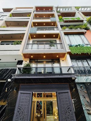 nhà mới 5 tầng-thang máy 1 trục đường thông phan huy ích-bờ kè tham lương,oto ngủ trong nhà.q.gv