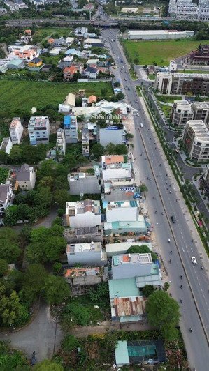 tôi cần bán nhanh nền đất 125m2(5x25) mặt tiền đỗ xuân hợp sổ cá nhận đối diện the global city