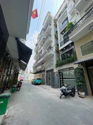bán nhà 5 tầng hương lộ 2 hẻm xe hơi thông lê văn quới