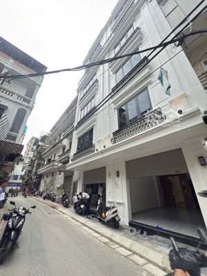 mặt phố đội nhân, ba đình -40m - mặt tiền 4,5m -7 tầng thang máy lô góc vỉa hè , ô tô tránh, kd