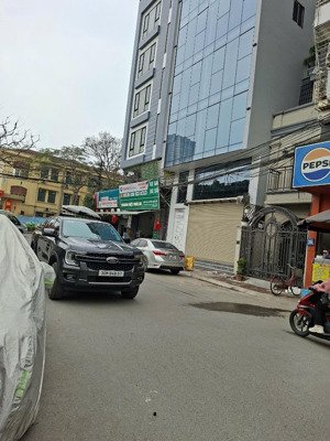 toà nhà dịch vụ phân lô vỉa hè kinh doanh 3 oto tránh nhau phùng khoang 107m 8 tầng thang máy