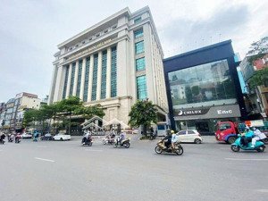 90 tỷ nhỉnh sở hữu toà nhà mặt phố đê la thành 320*12t mt14m lô góc 3 thoáng, dòng tiền 550tr/th