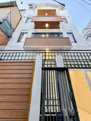 nhỉnh 7ty-nhà 5 tầng 4pn 40m2 sát mặt tiền huỳnh văn bánh,phú nhuận