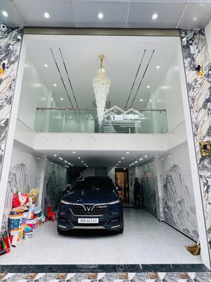 bán nhà đẹp đường láng-ô tô vào nhà,thiết kế hiện đại-dt48m 7 tầng thang máy-2 mặt tiền-chỉ 19.5 tỷ