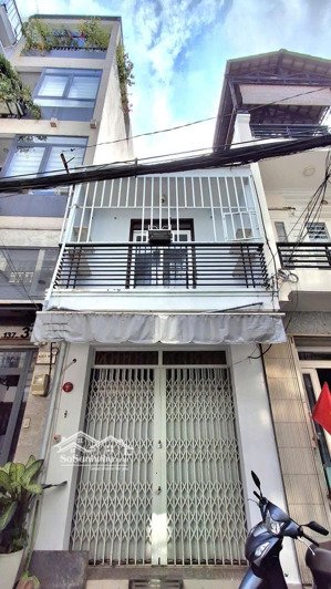 hẻm xe hơi kinh doanh lê văn sỹ,được xây 4 tầng,hẻm thông,sạch sẻ