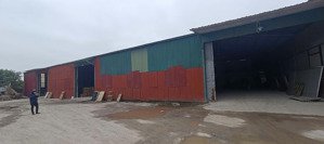 cho thuê kho đường đại lộ thăng long, hoài đức. dt 1100m2, cao 8m, xe công đỗ cửa. giá 65k/m2