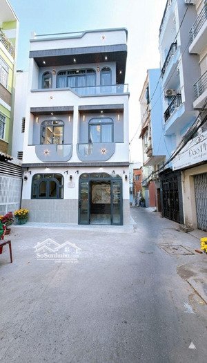 mua bán nhà quận 4, 35m2 đất, 4 tầng, đường số xe hơi, trục đường tân vĩnh !