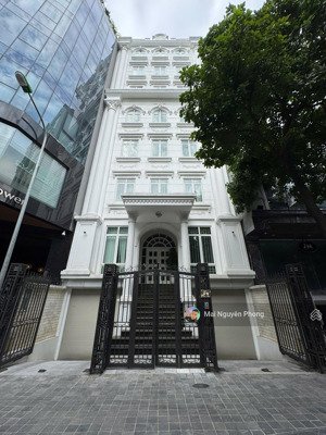 bán toà vp nguyễn bá khoản cầu giấy,80m2 34tỷ 9t thông sàn có hầm,phân lô bàn cờ đi bộ ra mặt phố