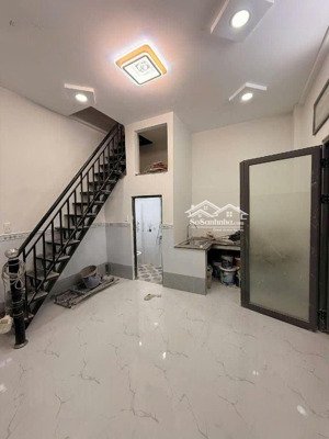 nhà mới 2 tầng hẻm 6m xe hơi gò xoài,