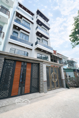 nhà 5 tầng có thang máy hẻm ô tô thông 50m ra lê văn việt, q9 ( hiếm )