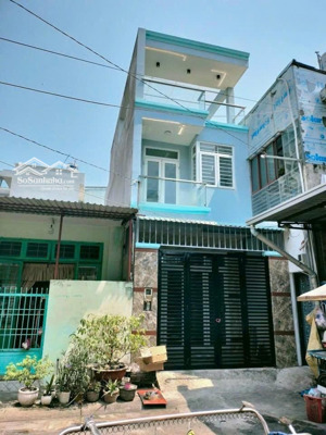 5 tỷ 500 tr _ nhà 1 trệt 1 lầu + tum + sân thượng _ sát bên chợ đầu mối nông sản thủ đức.