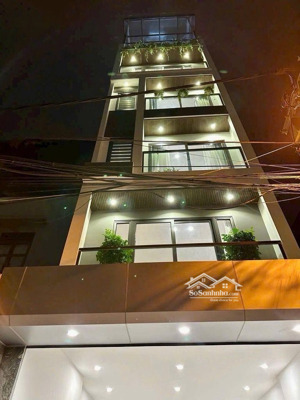 phố đàm quang trung- 6tầng thang máy- ngõ thông bàn cờ -ô tô 7 chỗ vào nhà