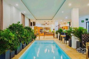 villa 4 tầng mặt tiền đường nguyễn hữu thông có thang máy- hồ bơi- gọi đàm tiến
