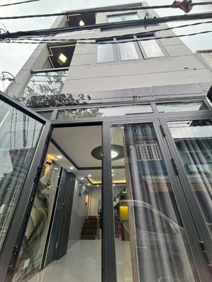 nhà mới ở ngay hẻm xe tải thông 3 tầng 4pn giá 4.05 tỷ