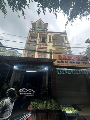 bán gấp nhà 4tầng mt chợ đỗ nhuận , tân phú . 4 x 18,3m giá 9,6 tỷ .