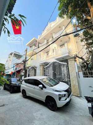 * bán nhà nơ trang long, bình thạnh. ngang 8.5m dt 165m2 hầm + 4 tầng + thang máy + 20 phòng....