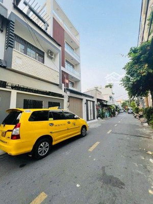 chỉ: 9 ty xíu. nhà mặt tiền đẹp ở và kd ổn áp.4 tầng dương tự quán. dt: 5 x 19 kế bx m tây. xem mê