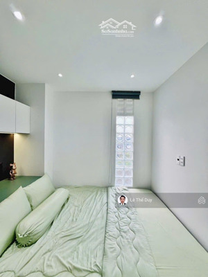 nhà đẹp siêu phẩm gần sân bay đường số 28 p. an nhơn xe hơi trong nhà hướng đông nam 3 pn