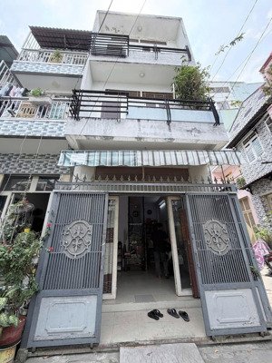 nhà 2 lầu hẻm thoang 4m gần cầu nguyễn tri phương