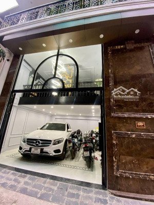 bán nhà phân lô hoàng cầu, 50m2x7t thang máy xây mới, mặt tiền 6.9m, ô tô đỗ cửa - vào nhà, 27.5 tỷ