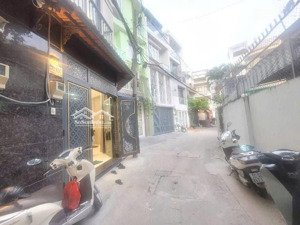 hxh lê quang định p.gia định bình thạnh 4 tầng nở hậu 6.8m 38m