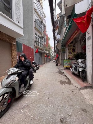 tt đống đa - 6.5 tầng lô góc - 2 mặt tiền - ngõ thông - kinh doanh - ô tô tránh đỗ