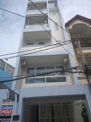 toà nhà 7 tầng đường phổ quang (5mx24m. nở hậu 6,5m). giá 29 tỷ