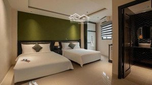 khách sạn 7 tầng mặt tiền 11m quá hiếm - cách biển 200m - 35 phòng - dòng tiền 120tr/th