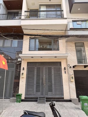 bán nhà mt đường số trung tâm quận 7 - kết cấu 6 tầng có thang máy - xe hơi đậu trong nhà