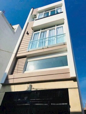 bán nhà huỳnh đình hai bình thạnh ngay chợ bà chiểu. 5 tầng kiên cố, ô tô đổ cửa 4pn hướng đông