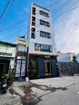 nhà full nội thất 5 tầng 4 phòng ngủ, đường phan anh. lh 