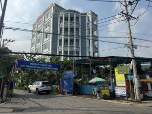 ngộp bank tòa nhà góc đường lê văn lương tphcm (12x50 - 6 tầng - hđt: 100tr - gía: 31 tỷ)