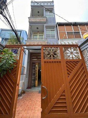 nhà 4 tầng căn góc 3 mặt hẻm p.5 q.6 7 tỷ 780